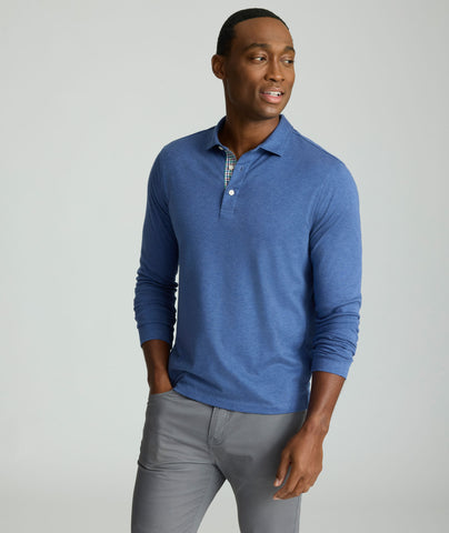 Model is wearing UNTUCKit Wrinkle-Free Long-Sleeve Polo in Heather Gray Blue.