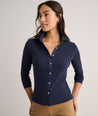 Model is wearing UNTUCKit Jersey Knit Ribbed Carina Shirt.