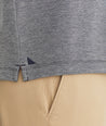 Model is wearing UNTUCKit Cascudo long sleeve pique henley in sky Captain.