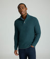 Model is wearing UNTUCKit Cable-Knit Button Neck Sweater in forest. 