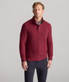 Model is wearing UNTUCKit Cable-Knit Button Neck Sweater in red. 