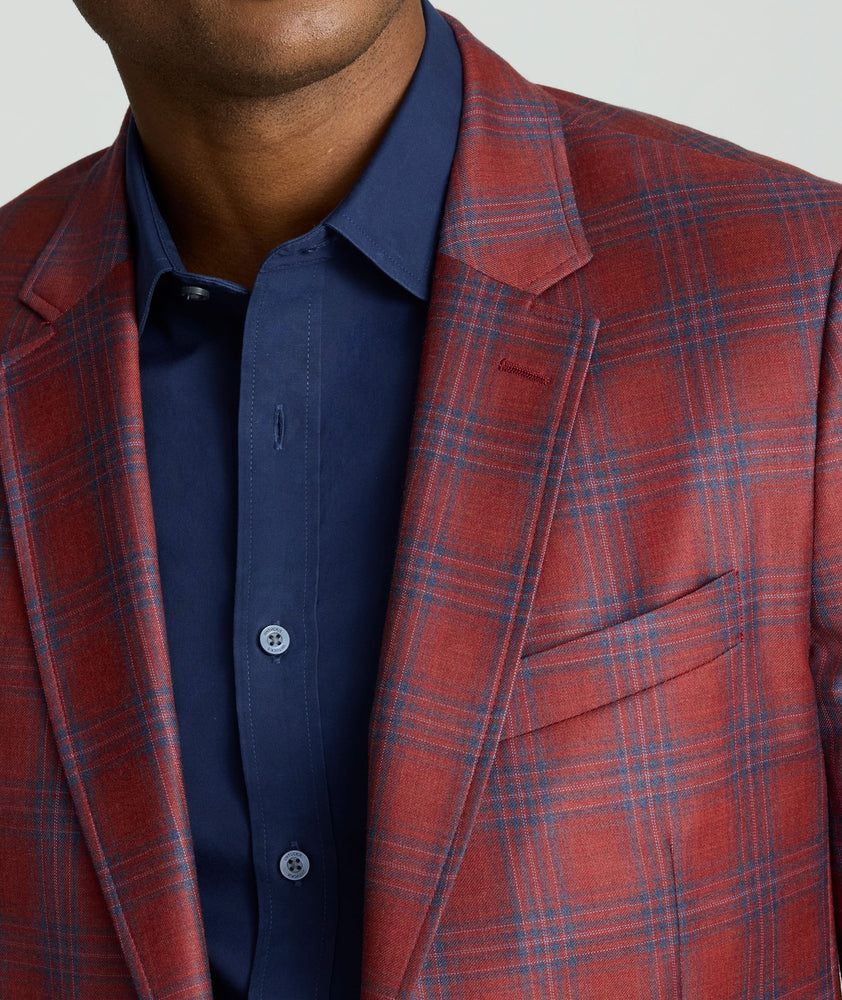 Model is wearing UNTUCKit Italian Wool Charbell Sport Coat. 