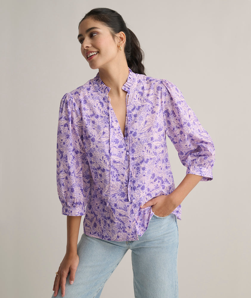 Model is wearing UNTUCKit Charlie shirt in floral print. 