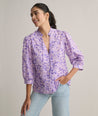 Model is wearing UNTUCKit Charlie shirt in floral print. 