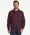 Model is wearing UNTUCKit Chaselo Brushed Overshirt in White & Red Check.