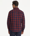 Model is wearing UNTUCKit Chaselo Brushed Overshirt in White & Red Check.