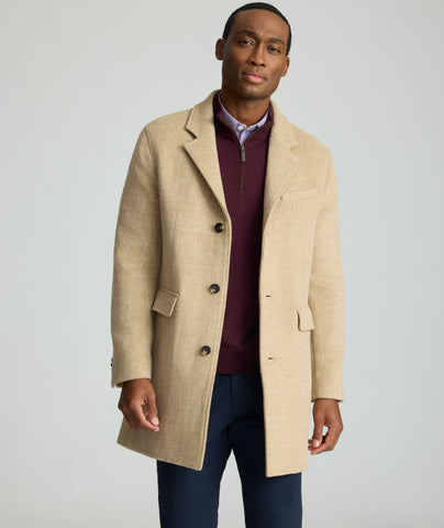 Model is wearing UNTUCKit Wool Top Coat.