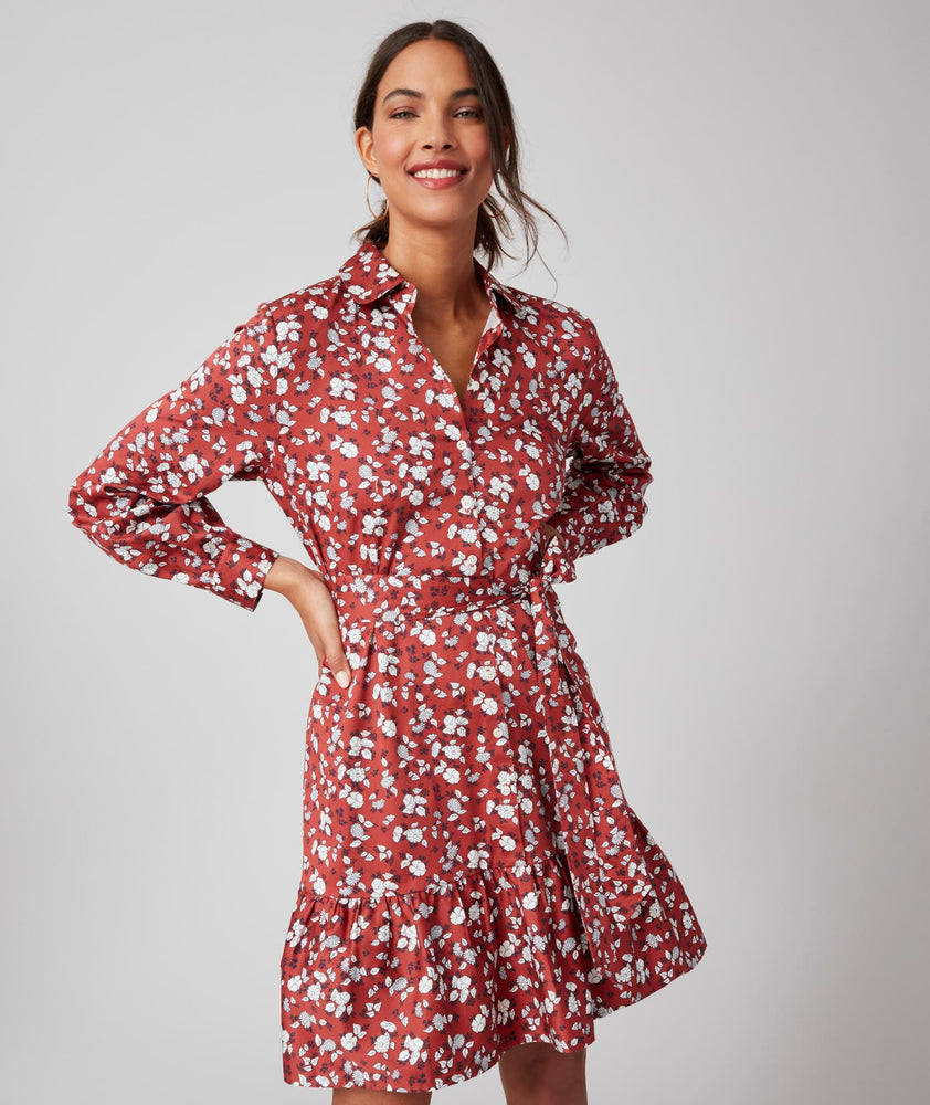 Model is wearing UNTUCKit Chessie Dress in red. 