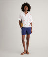 Model is wearing UNTUCKit Cotton Tomato Print Chrissy Shirt in Tomato Print.