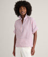 Model is wearing UNTUCKit Linen Chrissy Shirt. 