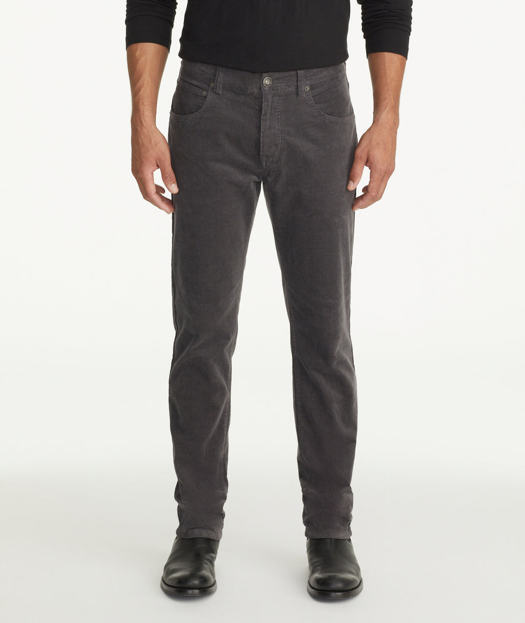 Model is wearing UNTUCKit christow pants in gray.