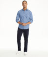 Model is wearing UNTUCKit Christow Cord Pant in Navy