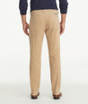 Model is wearing UNTUCKit Christow Cord Pant in Tan.