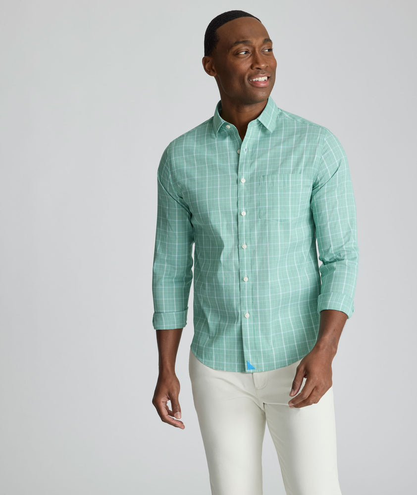 Model is wearing UNTUCKit CottonTek Claremont Shirt in green.