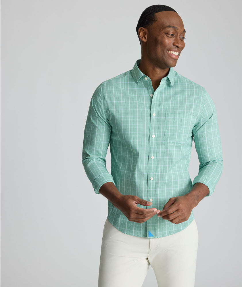 Model is wearing UNTUCKit CottonTek Claremont Shirt in green.
