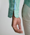 Model is wearing UNTUCKit CottonTek Claremont Shirt in green.