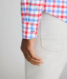 Model is wearing UNTUCKit Clarkson cotton linen shirt in red. 