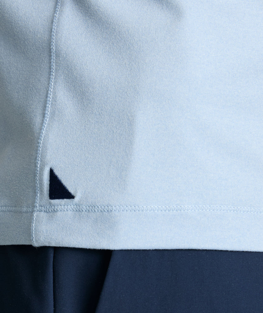 Model is wearing UNTUCKit Clavier performance polo.