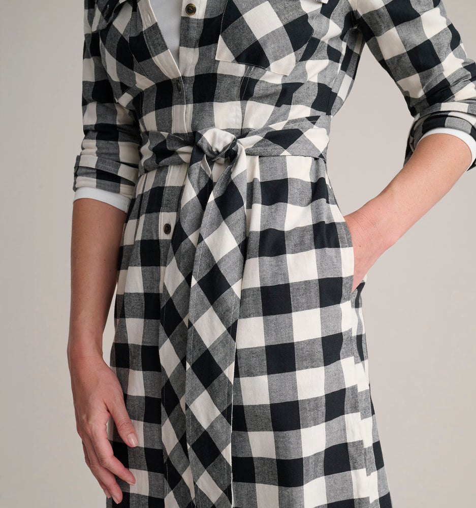 Model is wearing UNTUCKit Colby dress in buffalo check. 