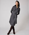 Model is wearing UNTUCKit Colby dress in solid gray.