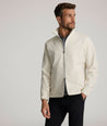 Model is wearing UNTUKit Connolly jacket in silver birch. 