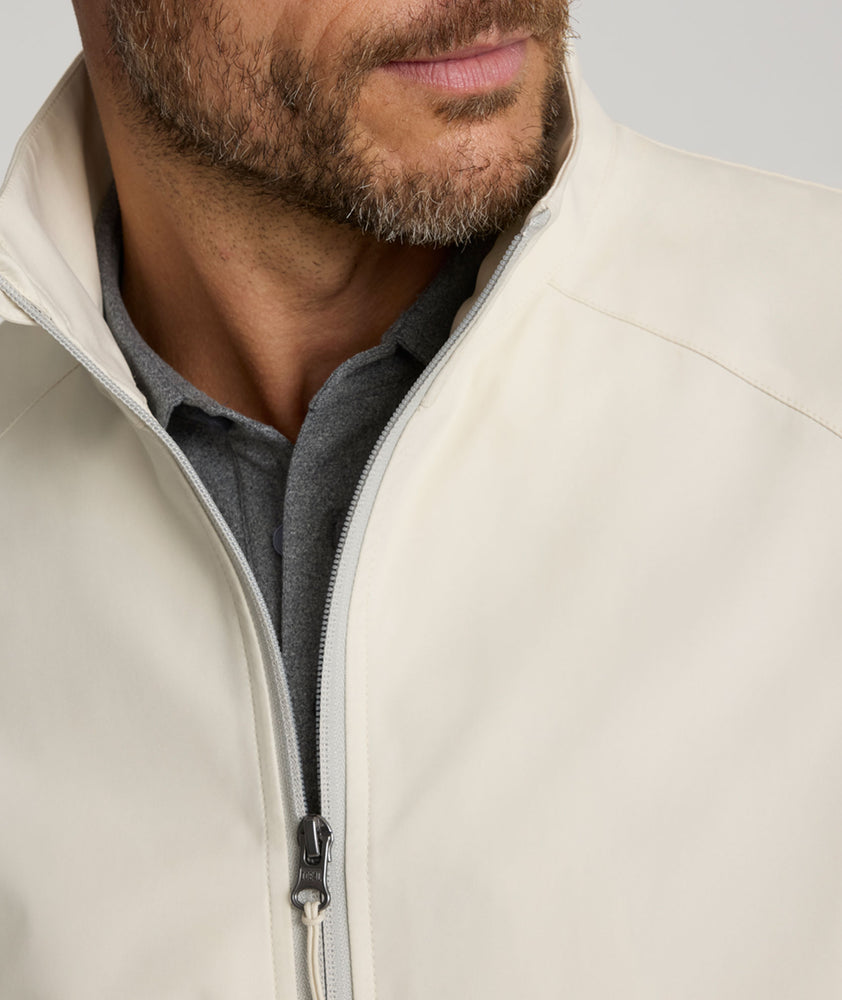Model is wearing UNTUKit Connolly jacket in silver birch. 