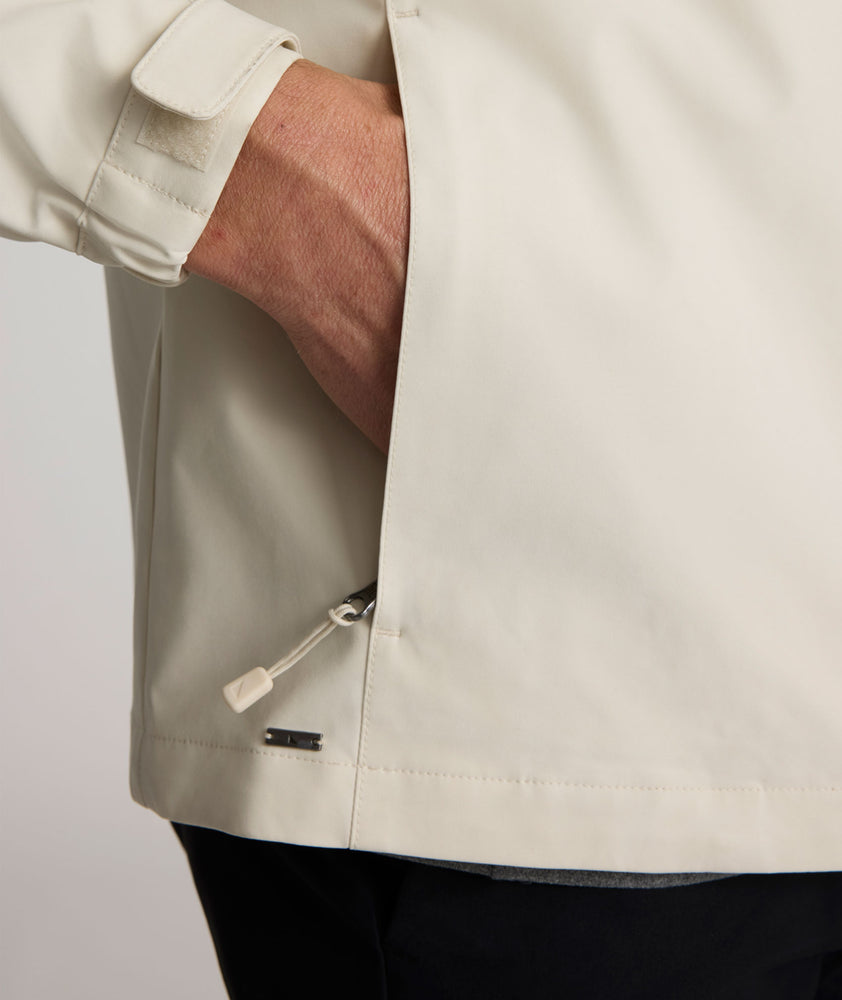 Model is wearing UNTUKit Connolly jacket in silver birch. 