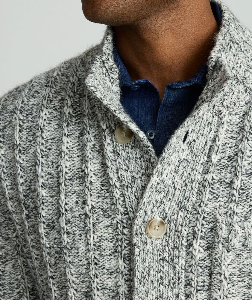 Model is wearing UNTUCKit Chunky Knit Cardigan in gray. 