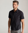 Model is wearing UNTUCKit castello in black.