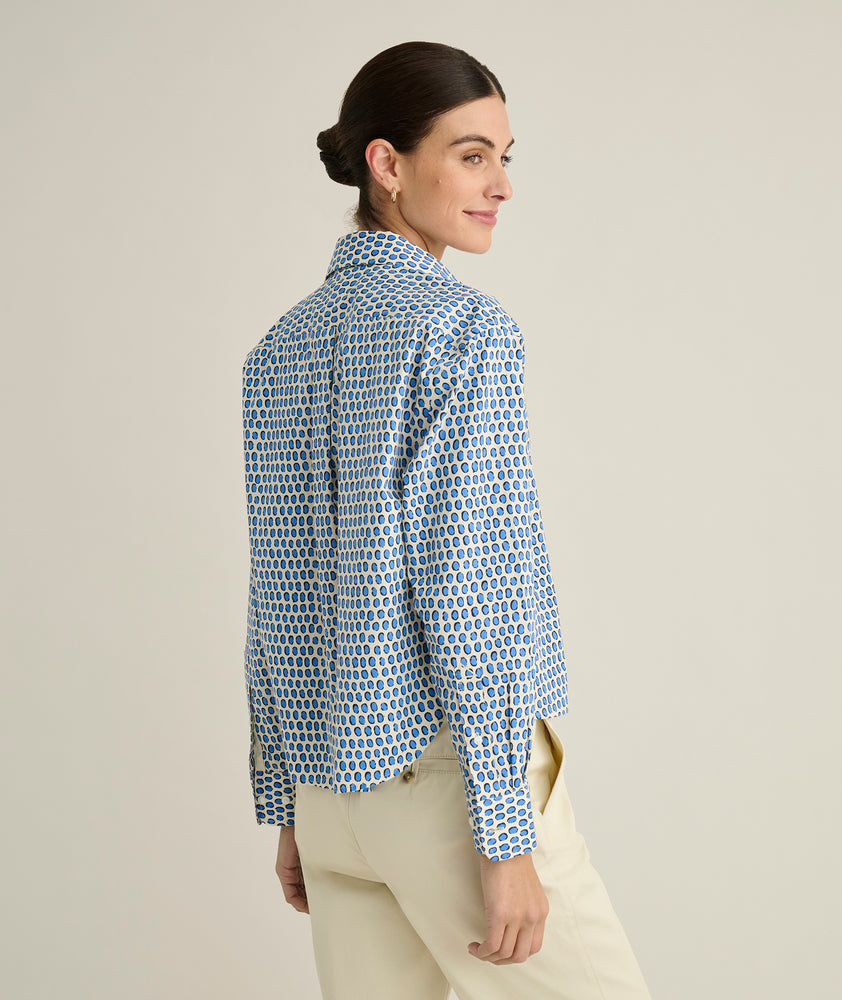 Model is wearing UNTUCKit Crosby shirt in Navy. 