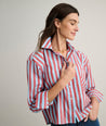 Model is wearing UNTUCKit Crosby shier in red and blue stripes. 
