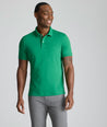 Model is wearing UNTUCKit Wrinkle-Free Damaschino Polo in bright green. 