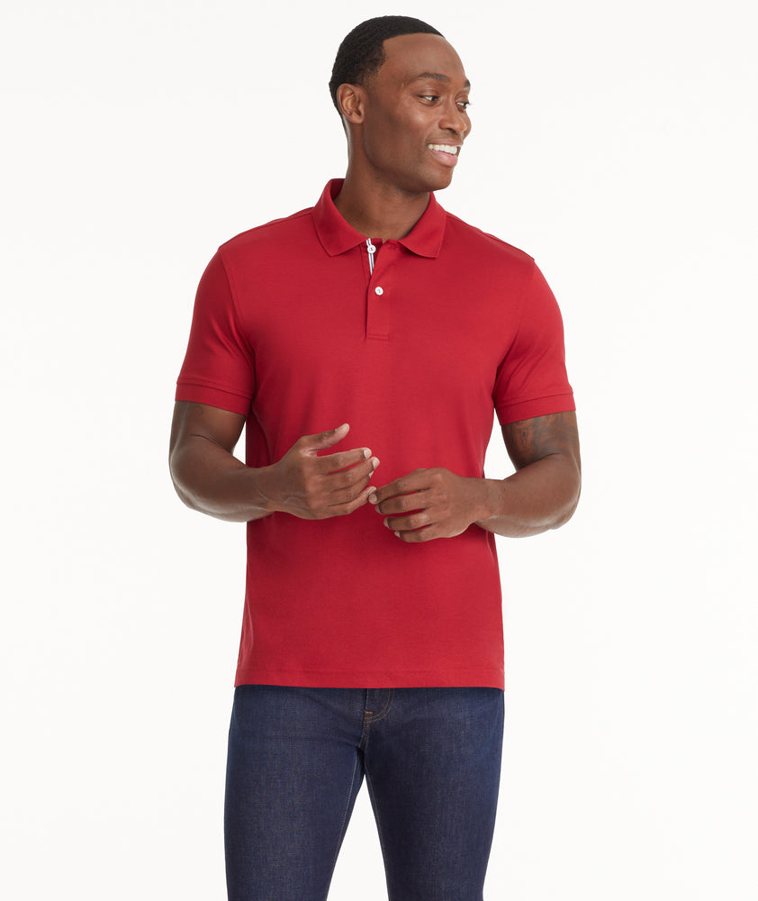 Model is wearing UNTUCKit Wrinkle-Free Damaschino Polo in scooter
