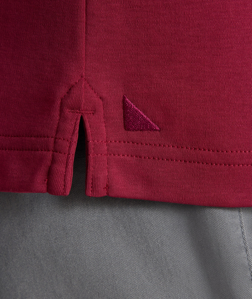 Model is wearing UNTUCKit Wrinkle-Free Damaschino Polo in Burgundy.