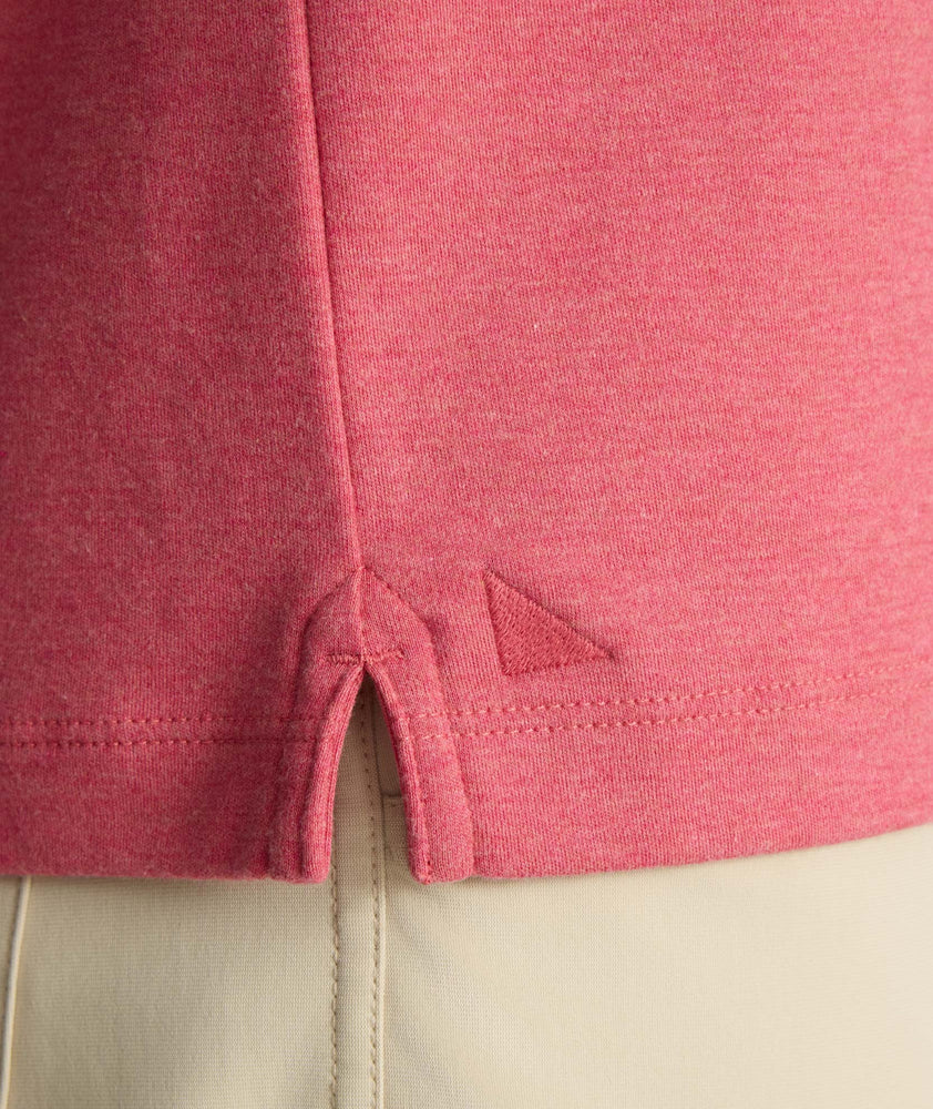 Model is wearing UNTUCKit Wrinkle-Free Damaschino Long-Sleeve Polo in Heather Pink. 