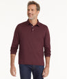 Model is wearing UNTUCKit Wrinkle-Free Long-Sleeve Damaschino Polo in Deep Purple.
