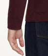 Model is wearing UNTUCKit Wrinkle-Free Long-Sleeve Damaschino Polo in Deep Purple.