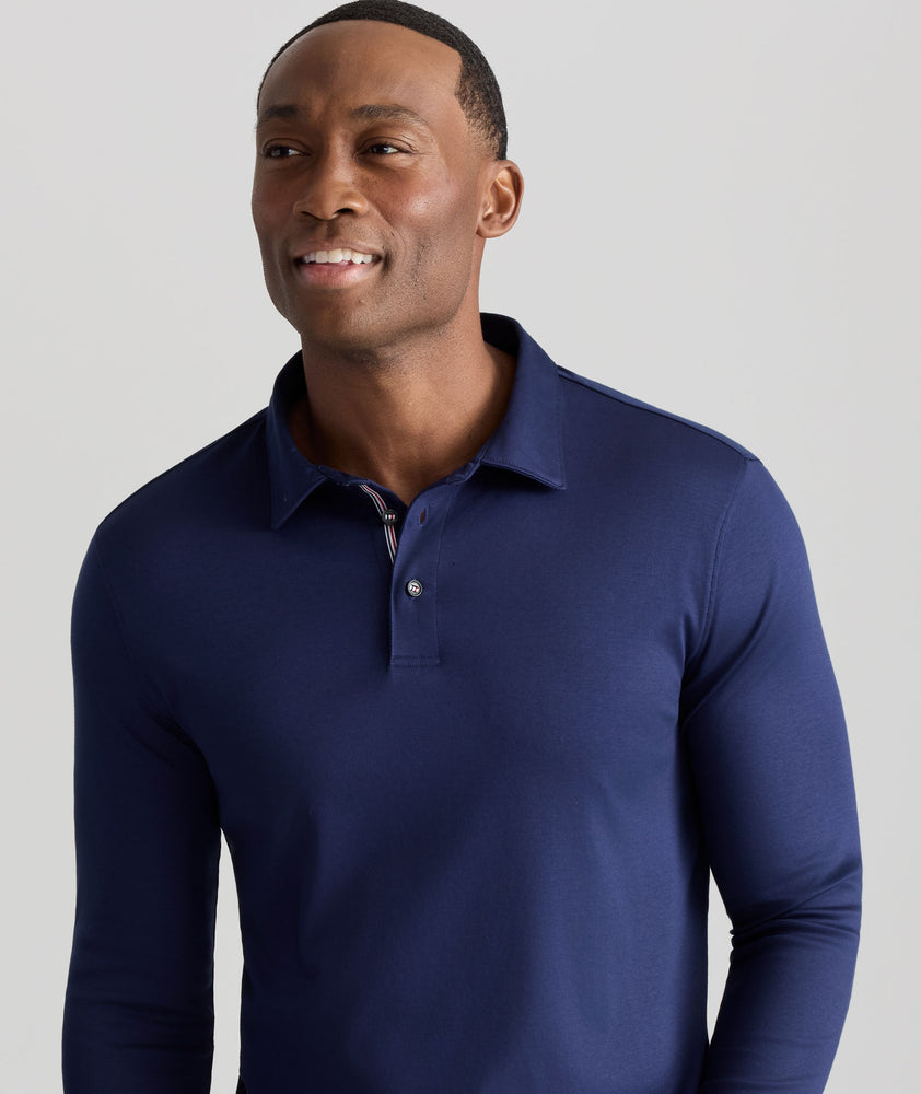 Model wearing a Navy Wrinkle-Free Damaschino Long-Sleeve Polo