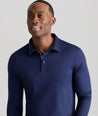Model wearing a Navy Wrinkle-Free Damaschino Long-Sleeve Polo