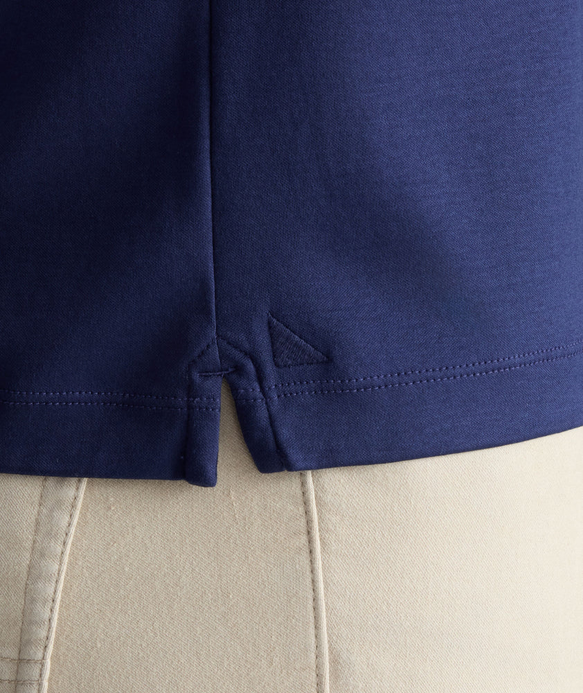 Model wearing a Navy Wrinkle-Free Damaschino Long-Sleeve Polo