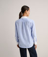 Model is wearing UNTUCKit End-on-End Bib Danielle Shirt.