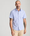 Model is wearing UNTUCKit Dante Short sleeve wrinkle-free shirt.