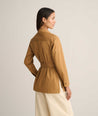 Model is wearing UNTUCKit Stretch Cotton Belted Popover Darcy Shirt. 
