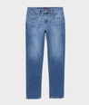 Model is wearing UNTUCKit denim in rinse. 