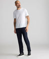 Model is wearing UNTUCKit Dark Wash Denim. 