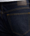 Model is wearing UNTUCKit Dark Wash Denim. 