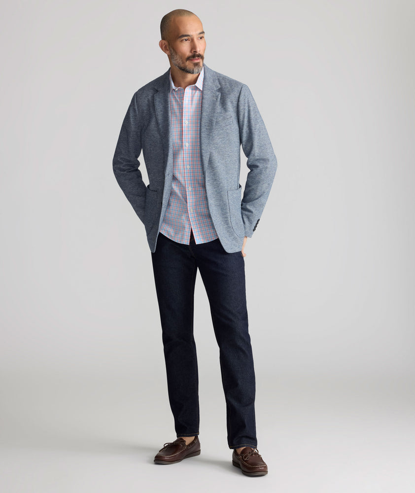 Model is wearing UNTUCKit Dark Wash Denim. 