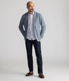 Model is wearing UNTUCKit Dark Wash Denim. 