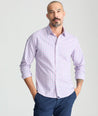 Model is wearing UNTUCKit dolcetto wrinkle free button down.