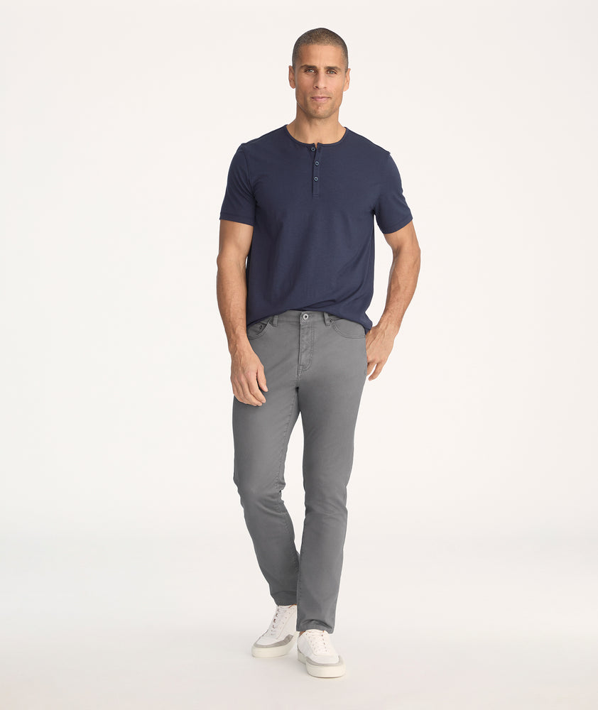 Model is wearing UNTUCKit 5-Pocket Chino Pants in Charcoal - full body